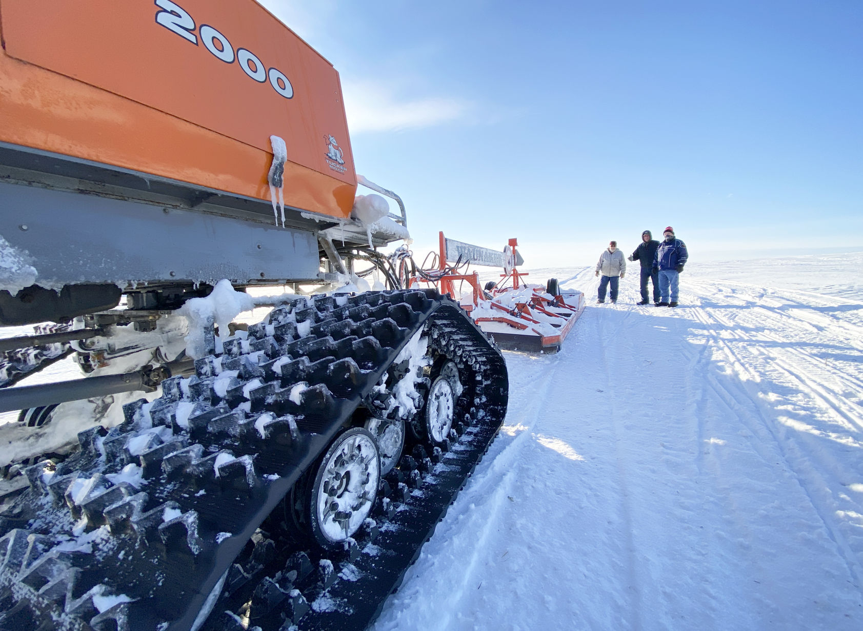 Grooming the snowmobile trail